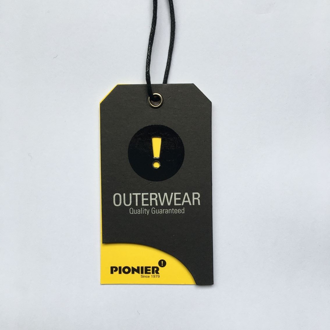 What are the production processes for clothing tags?
